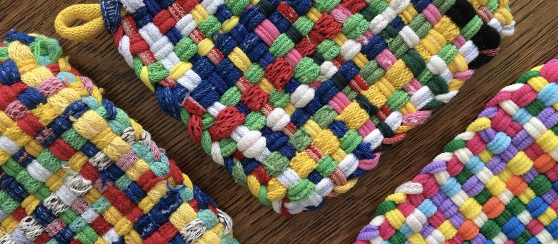 Potholders made with colorful loops and loom